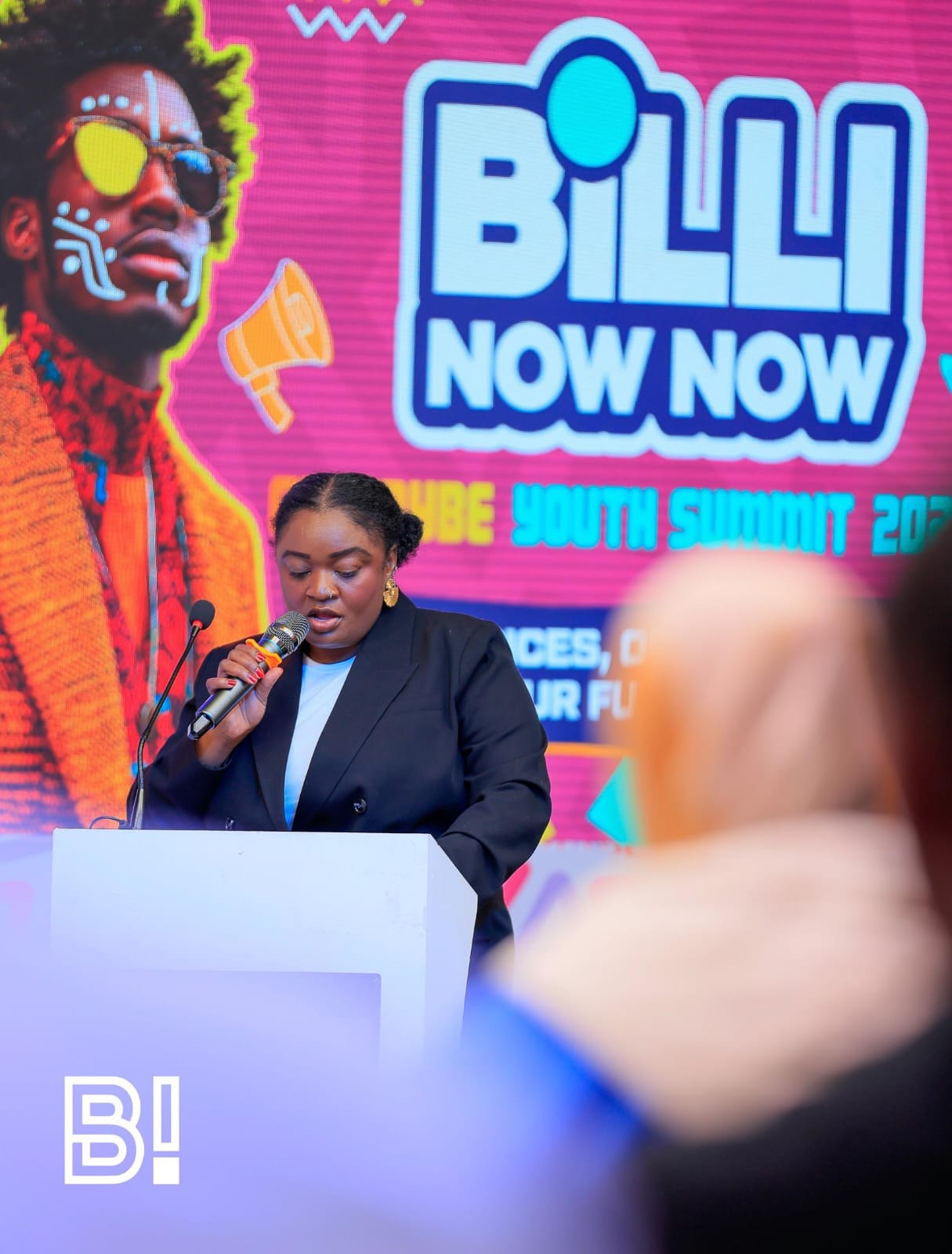 TSB facilitator speaking at youth summit on civic engagement